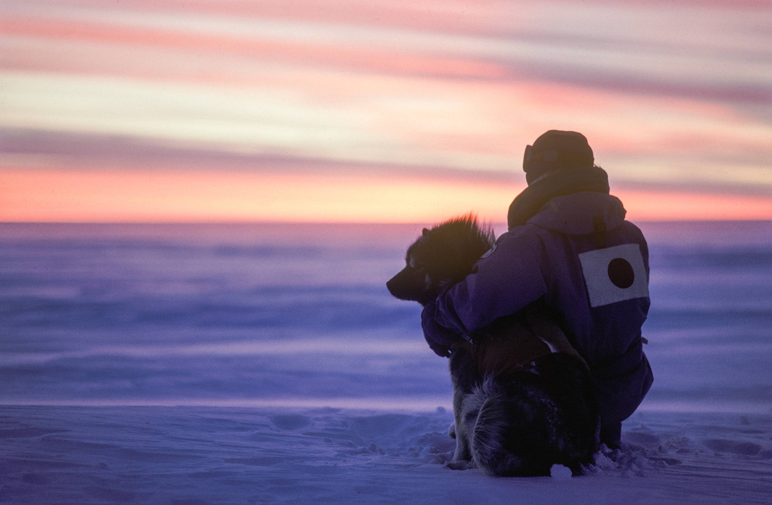 Trans-Antarctica-Expedition-Keizo-and-Odin-taking-in-the-sunset