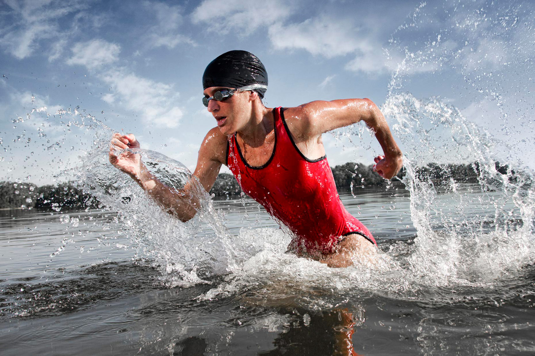 female_triathlete_running_out_of_the_water